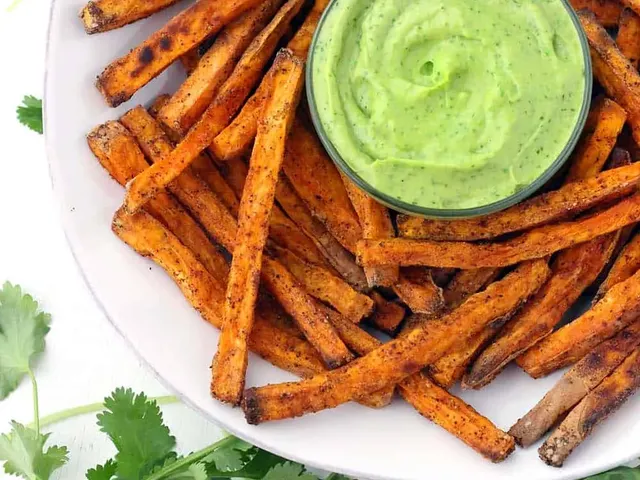 Crispy Baked Sweet Potato Fries with Avocado Cilantro Sauce