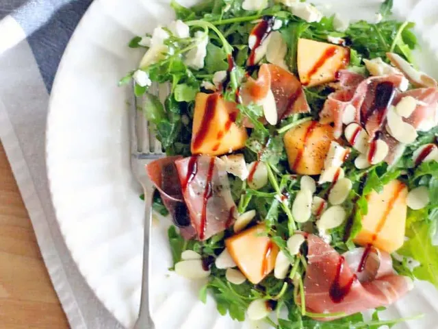 Arugula, Cantaloupe, and Prosciutto Salad with Goat Cheese and Almonds