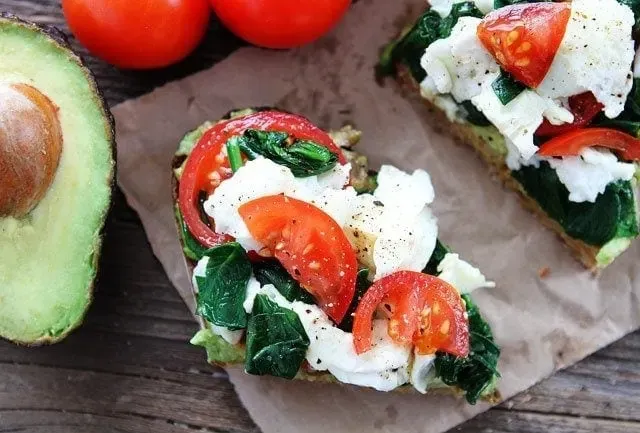 Avocado Toast with Eggs, Spinach, and Tomatoes