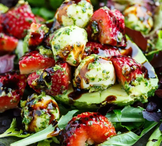 Strawberry Caprese Stuffed Avocados with Pistachio Pesto