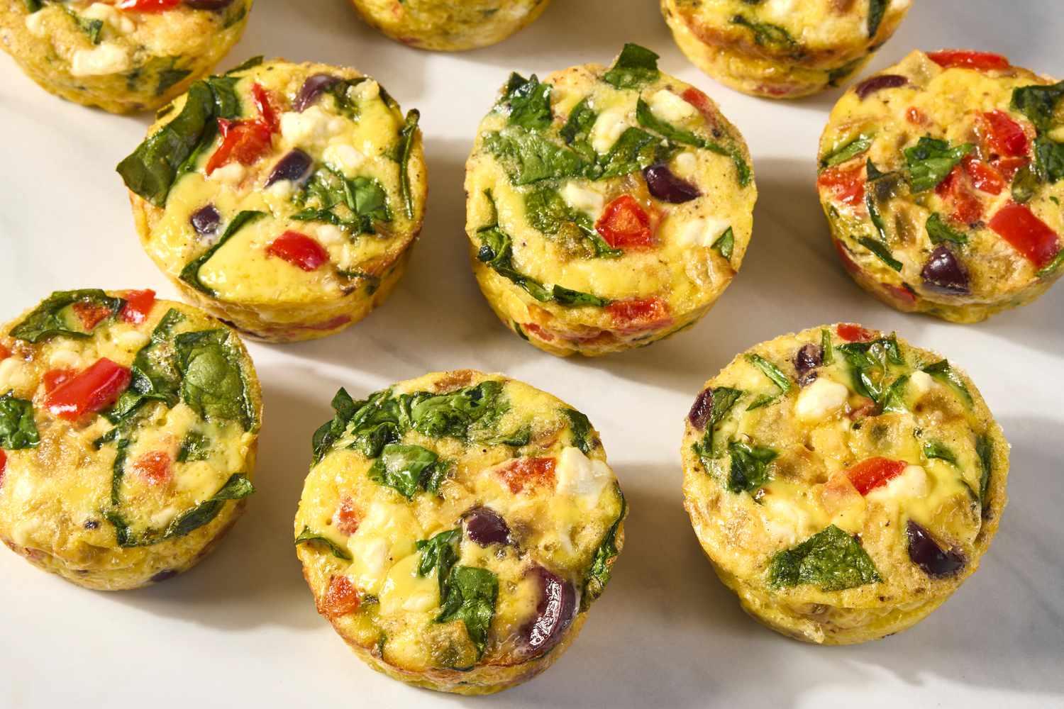 Muffin-Tin Omelets with Feta & Peppers Muffin-Tin Omelets with Feta & Peppers